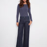Blue-black jeans featuring a long length and button front closure, perfect for versatile styling by Charlie B.