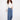 Blue jeans featuring a long length design and button front, perfect for any occasion by Charlie B.