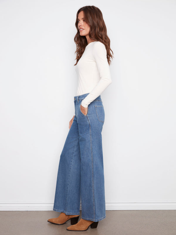 Crafted from stretch denim fabric, these wide-leg jeans provide comfort and style by Charlie B.