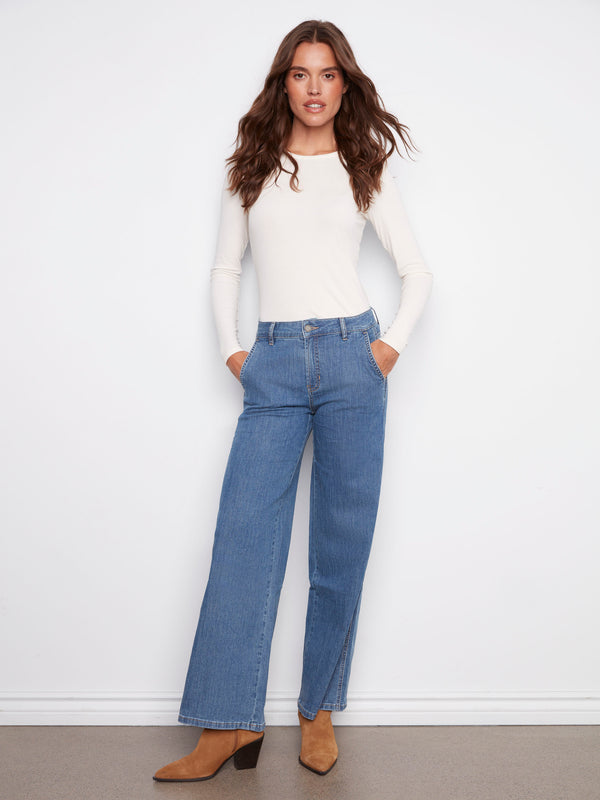 Wide-leg blue jeans designed with long-lasting stretch denim material for everyday wear by Charlie B.