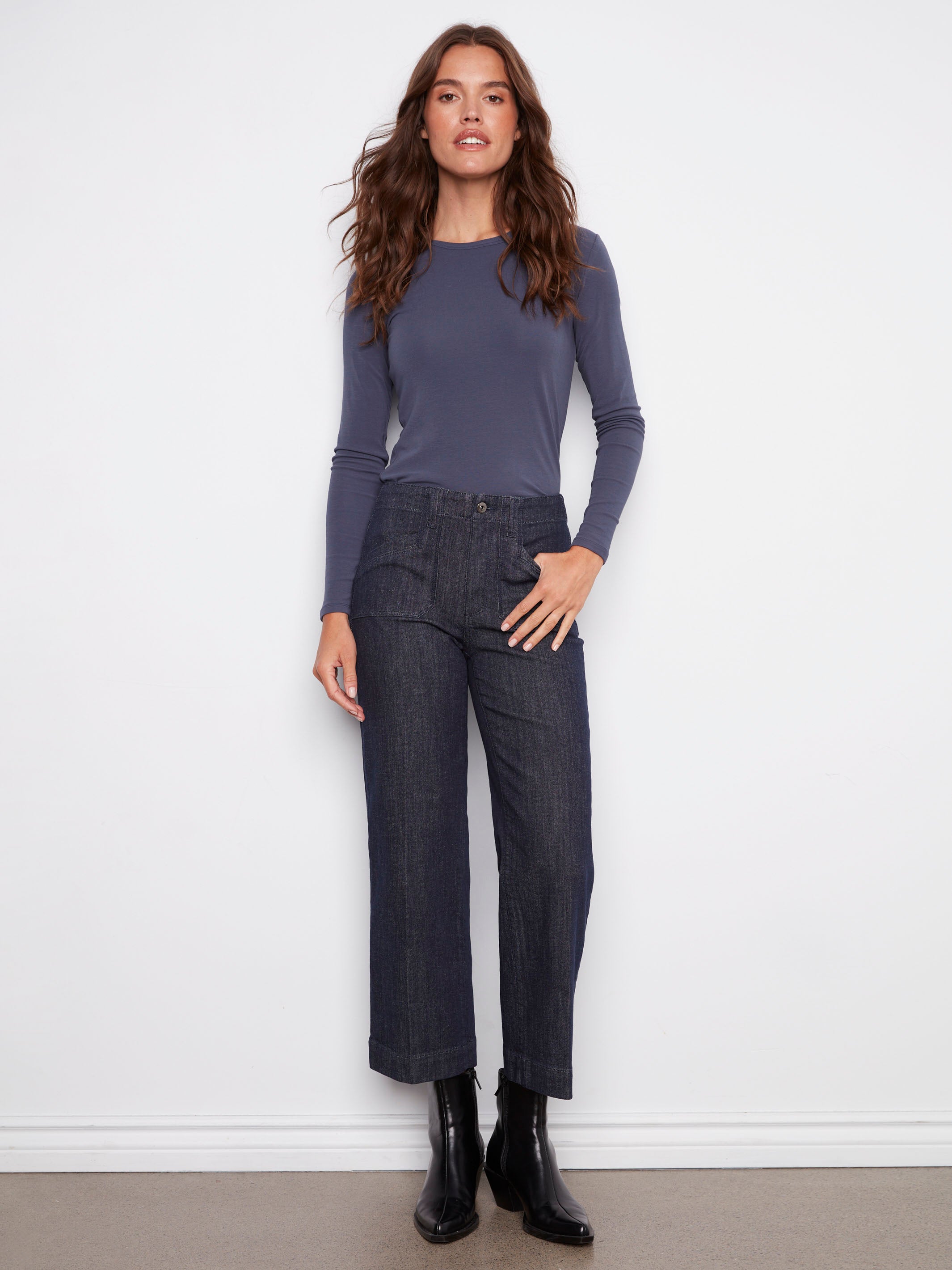 These jeans feature a wide leg design, adding a touch of flair to your wardrobe. Crafted with precision by Charlie B.