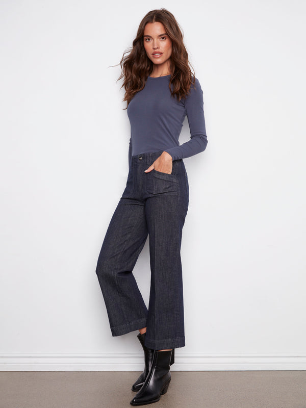 Front rectangular patch pockets add functionality and style to these chic denim jeans by Charlie B.