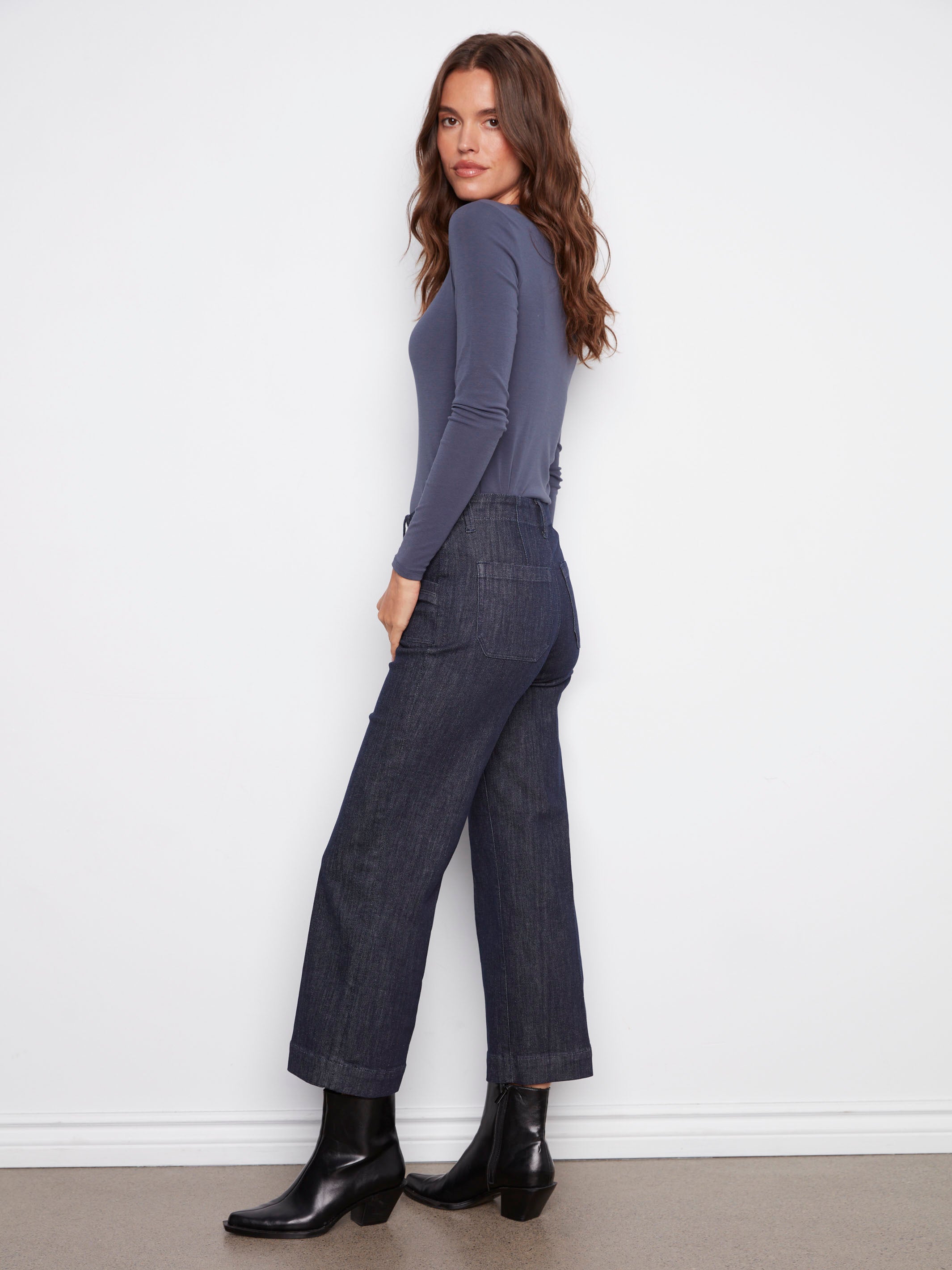Enjoy the comfort of stretch denim fabric in these stylish blue jeans, perfect for everyday wear by Charlie B.