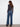 Jeans in indigo with wide leg cut and floral accents, designed for both comfort and fashion-forward appeal by Charlie B.