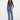 Medium blue jeans featuring a stylish raw hem and floral patches, perfect for casual outings by Charlie B.