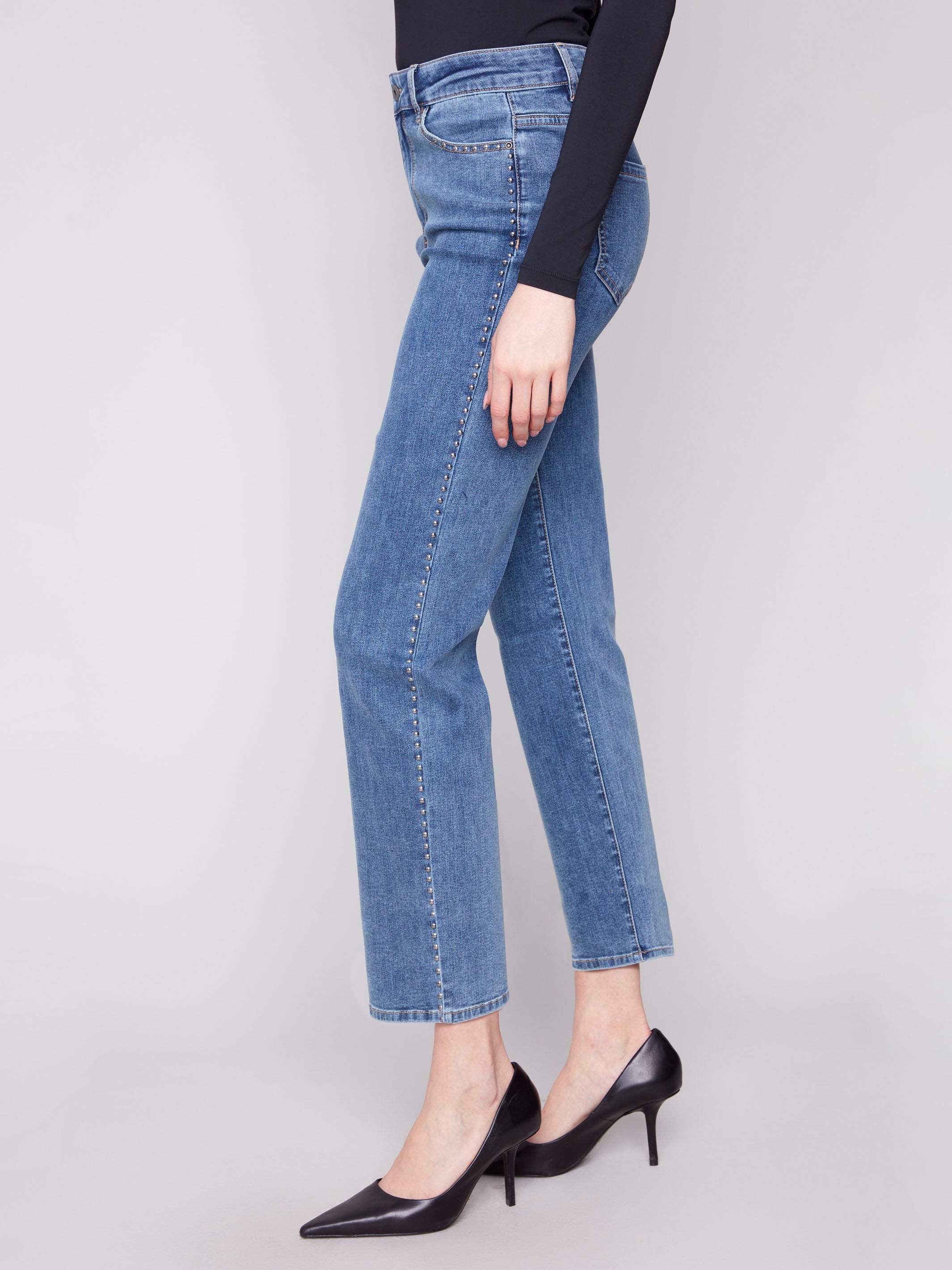 These stretch denim jeans offer both comfort and style, with a regular rise fit by Charlie B.