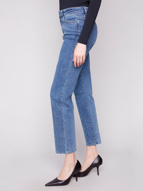 These stretch denim jeans offer both comfort and style, with a regular rise fit by Charlie B.