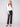 Black faux leather pants with a straight fit and stylish elastic waistband for comfort by Charlie B.