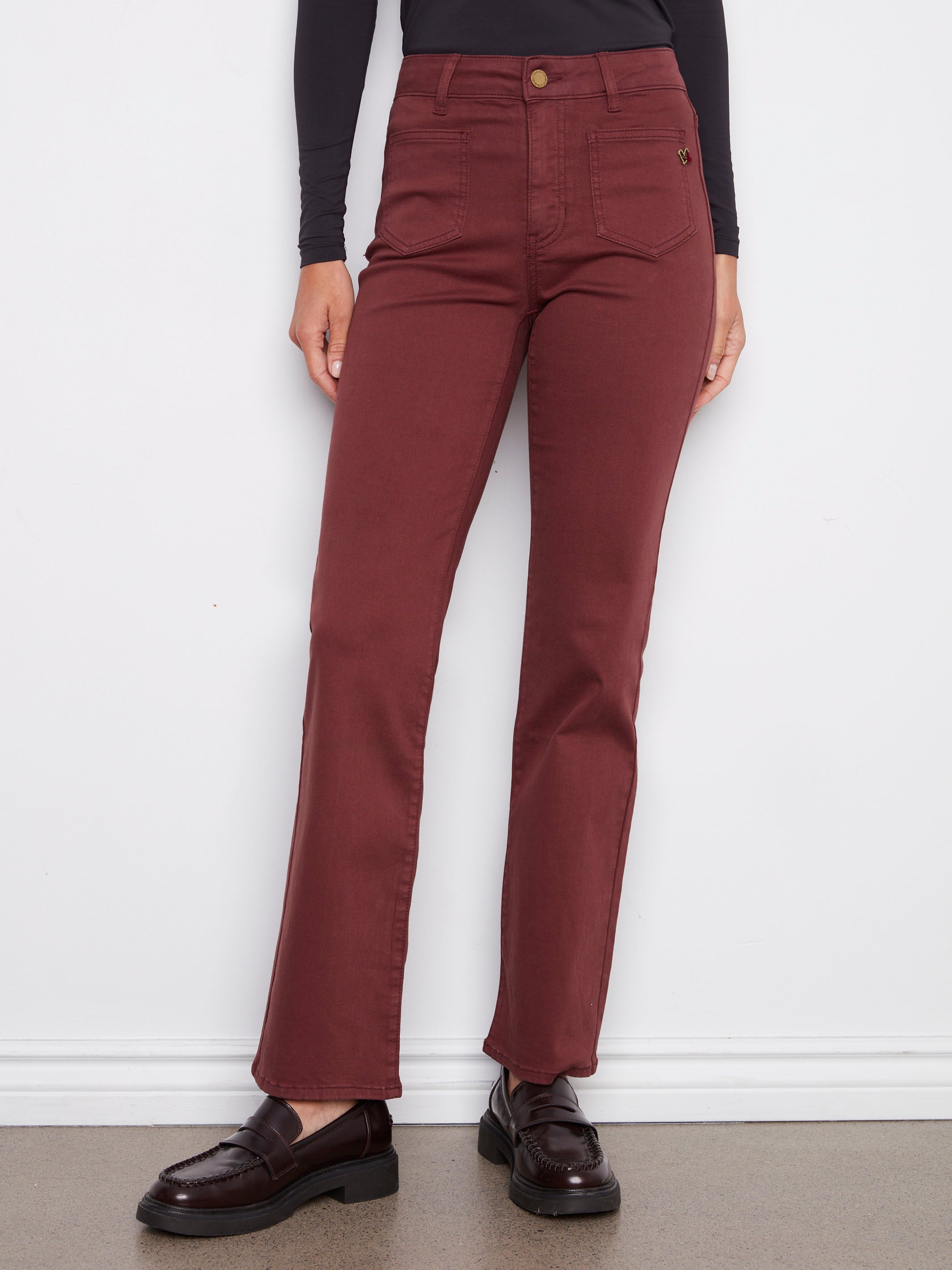 These pants offer a comfortable stretch twill fabric, enhancing both fit and style by Charlie B.