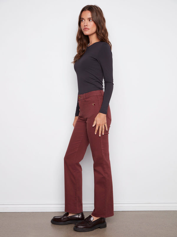 Regular rise cabernet pants with elegant detailing, a must-have addition to your wardrobe by Charlie B.