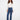 Indigo jeans with a regular rise and button details, crafted from stretch denim for comfort, designed by Charlie B.