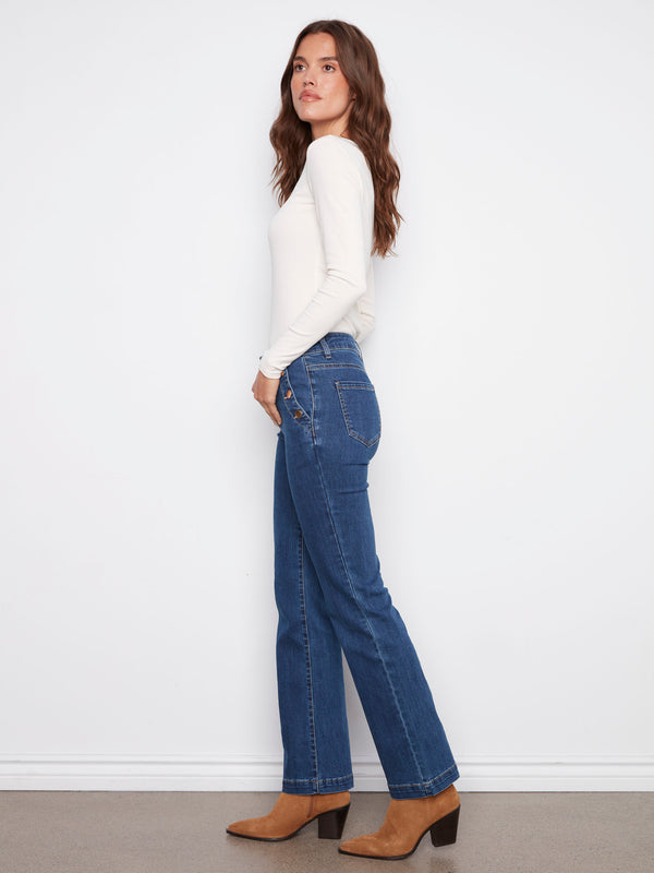 Crafted with back pockets and flare legs, these indigo jeans offer both style and functionality by Charlie B.