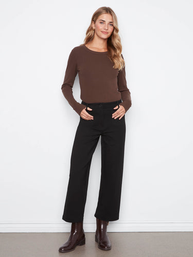 A versatile piece with wide legs and cropped length, perfect for pairing with various tops and shoes effortlessly. By Charlie B.