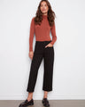 Black ponte pants with a cropped length, featuring two front patch pockets and belt loops for added style by Charlie B.