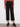 These black ponte pants showcase a zip fly with button closure, offering a sleek and comfortable fit by Charlie B.