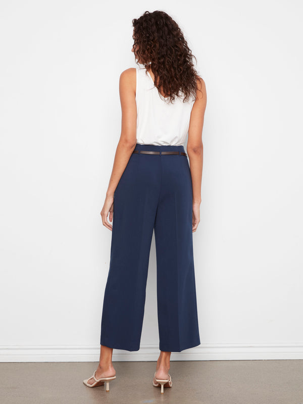 Cropped navy pants in stretch fabric with a stylish belted waist, perfect for modern dressing by Charlie B.