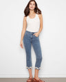 Blue cropped jeans with a slim fit and flared leg, highlighting the floral hem trim for a trendy look by Charlie B.