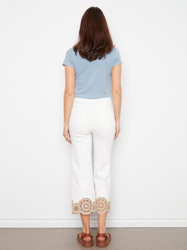 The flared design of these white pants adds a chic flair to your look, perfect for versatile styling by Charlie B.