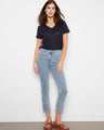 Light blue jeans in slim fit with a cropped length and detailed blanket stitch hem by Charlie B.