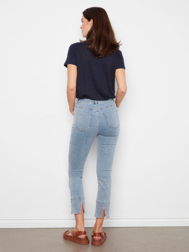Regular rise slim leg jeans with intricate embroidered border detail for added style by Charlie B.