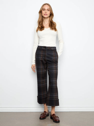 These pants showcase a chic wide-leg design, enhancing the plaid pattern and offering a stylish silhouette by Charlie B.
