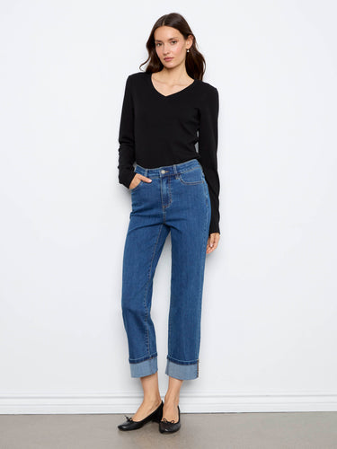 Crafted from stretch denim, these jeans offer a comfortable fit with stylish cuffed hems and leopard print accents by Charlie B.