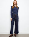 Denim pants featuring a stylish wide leg design and patch pockets, crafted with stretch denim for comfort by Charlie B.