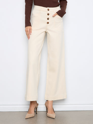 Ankle length pants featuring patch pockets, offering a blend of functionality and fashion. Made with care by Charlie B.