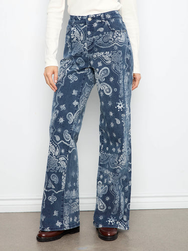 The intricate detailing on the fabric enhances the overall appeal of these stylish jeans. By Charlie B.