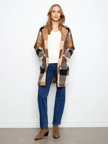 Featuring a classic button closure, this elegant coat is perfect for transitioning between seasons effortlessly by Charlie B.