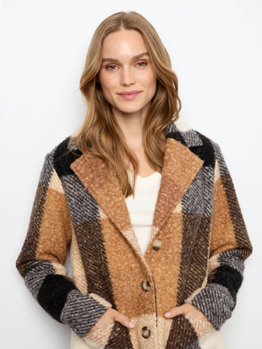Elegant longline silhouette of this coat provides a flattering fit, making it an essential addition to your wardrobe by Charlie B.