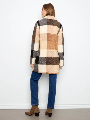 With its stylish tailored collar and practical patch pockets, this coat is both fashionable and functional for all occasions by Charlie B.