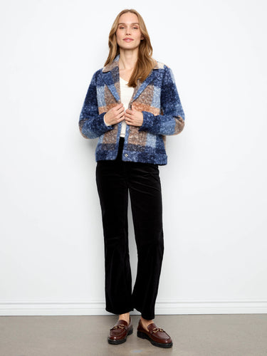 Chic jacket with snap-button closure, showcasing a cozy texture and vibrant colors. Perfect for casual outings. By Charlie B.