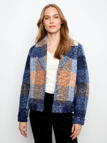 Sophisticated checkered pattern on this tailored collar jacket adds flair to any outfit while ensuring warmth. By Charlie B.