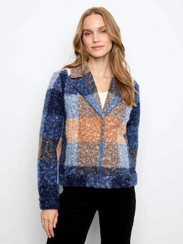 Stylish outerwear piece boasting snap-button closure and vibrant hues that make it stand out effortlessly. By Charlie B.