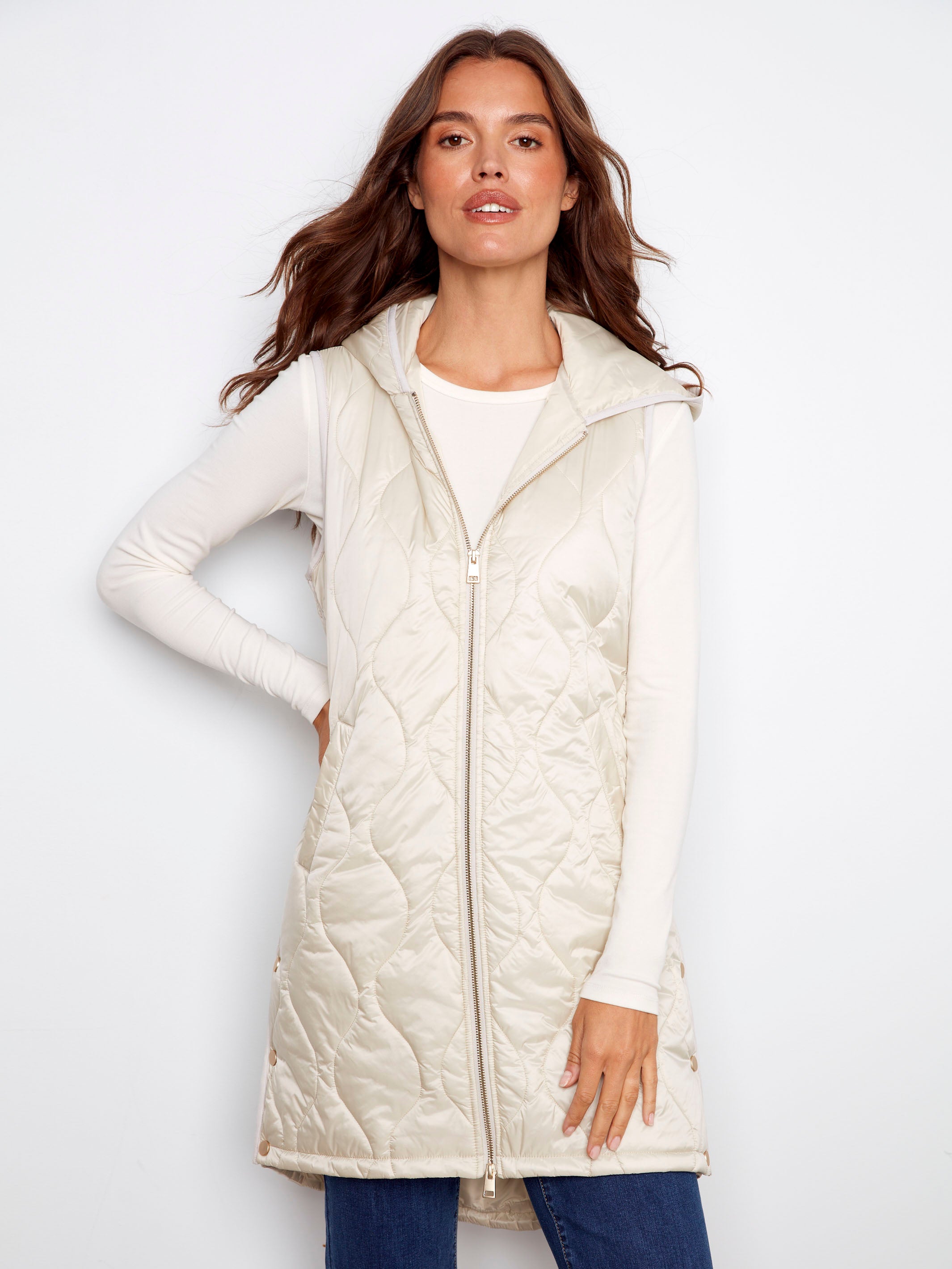Champagne long hooded vest with a pearlized finish and welt pockets by Charlie B.