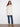 Champagne long hooded vest with a pearlized finish and welt pockets by Charlie B.