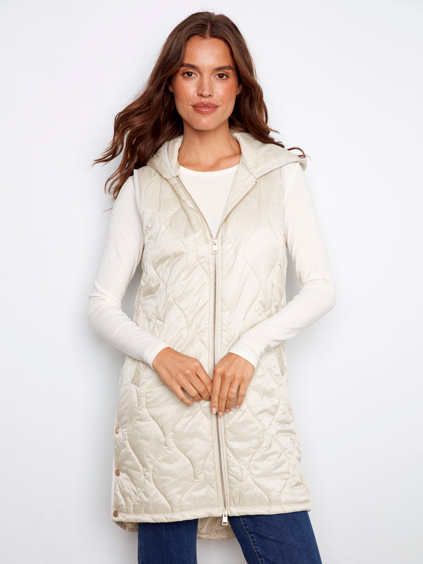 Champagne long hooded vest with a pearlized finish and welt pockets by Charlie B.