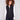 Elegant black vest with a floral quilted design and convenient welt pockets, perfect for layering by Charlie B.