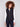 Elegant black vest with a floral quilted design and convenient welt pockets, perfect for layering by Charlie B.