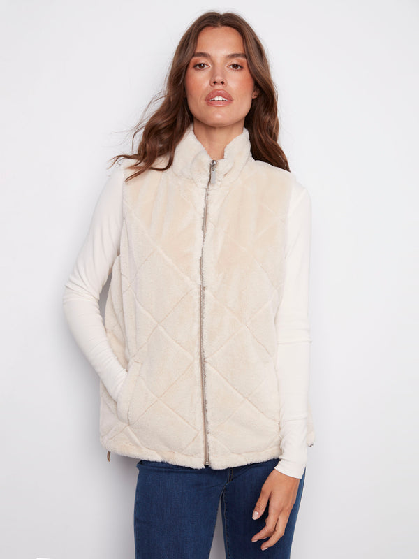 Reversible vest showcasing a soft faux fur side, offering warmth and versatility for different looks by Charlie B.