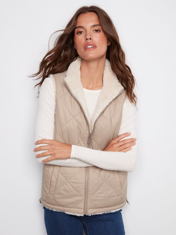 Versatile greige quilted vest designed with comfort in mind, featuring a cozy faux fur lining option by Charlie B.