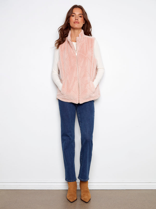 Stylish ballet pink vest with a zipper closure and versatile reversible feature for dual looks by Charlie B.