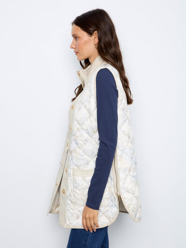 Side zipper details add a contemporary edge to the timeless look of the quilted vest. By Charlie B.