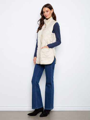 Modern stand collar design makes this quilted vest an essential fashion piece. By Charlie B.