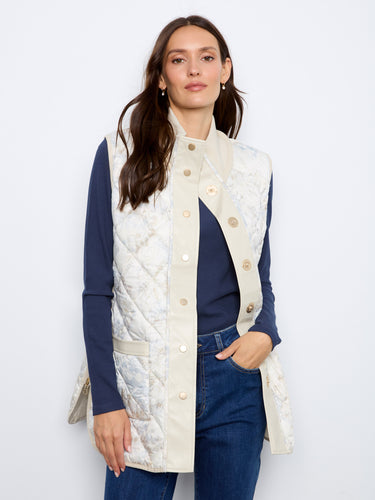 Reversible design adds versatility to your wardrobe with this chic quilted vest. By Charlie B.