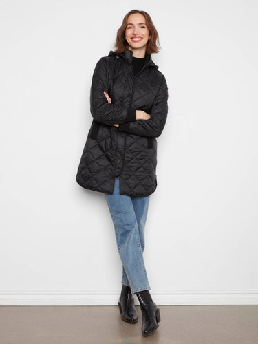 Versatile outerwear piece with front zip closure and snap buttons for easy layering options. By Charlie B.