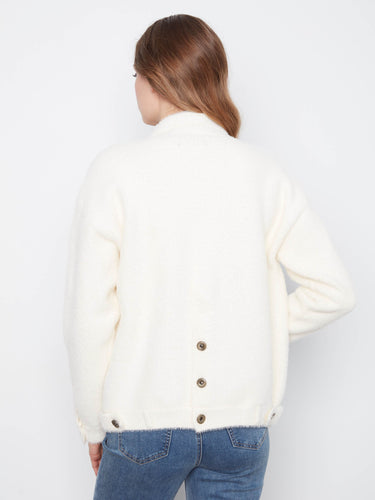 The relaxed fit of this fuzzy knit jacket ensures ease and comfort, making it a versatile addition to your wardrobe by Charlie B.
