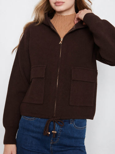 Elegant brown jacket with an adjustable drawcord hem, offering versatility and comfort in fit. Ideal for layering. By Charlie B.