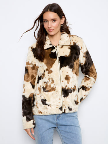 Faux fur jacket in cow print design, featuring convenient welt pockets for added functionality by Charlie B.